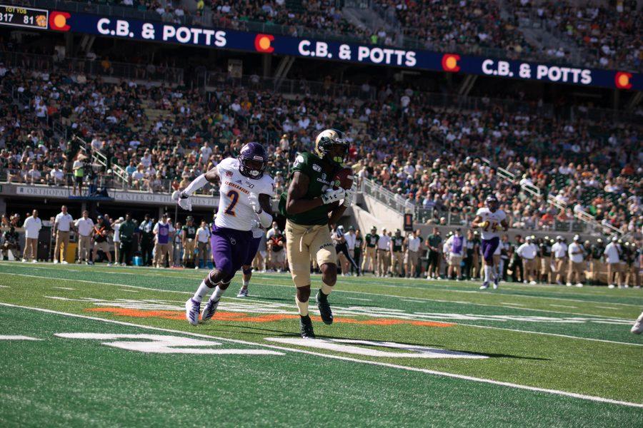 Ej Scott Jr. (3) catches a pass from Collin Hill(15) during CSU's first home game. CSU defeats Western Illinois 38-13. (Devin Cornelius | Collegian)