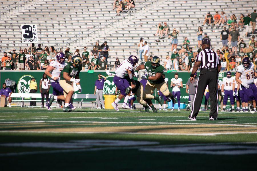 A CSU player make a big hit on WIUs running back, during CSUs first home game of the season. CSU defeats Western Illinois 38-13. (Devin Cornelius | Collegian)