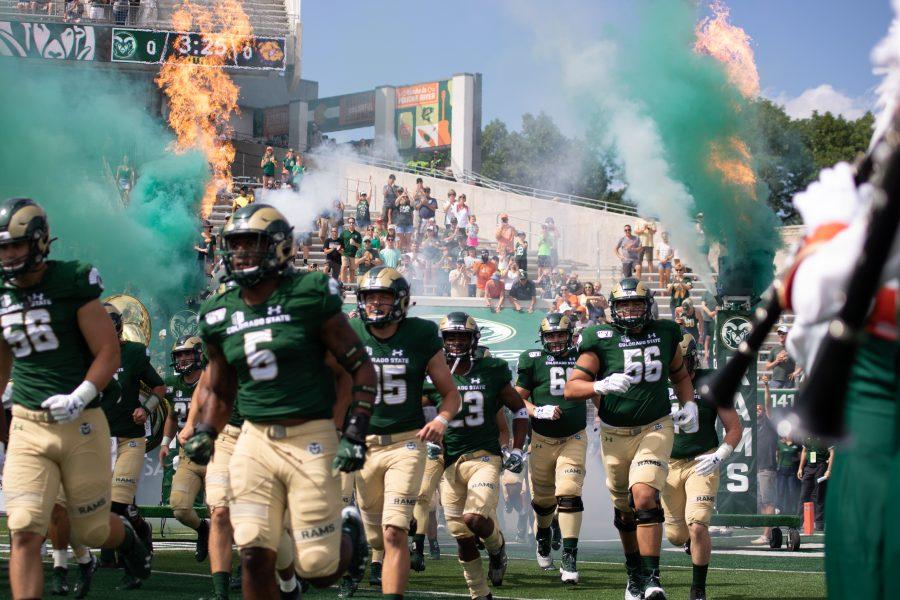 The CSU football team runs out on to the field before the opening home game against Western Illinois. CSU wins 38-13 (Devin Cornelius | Collegian)