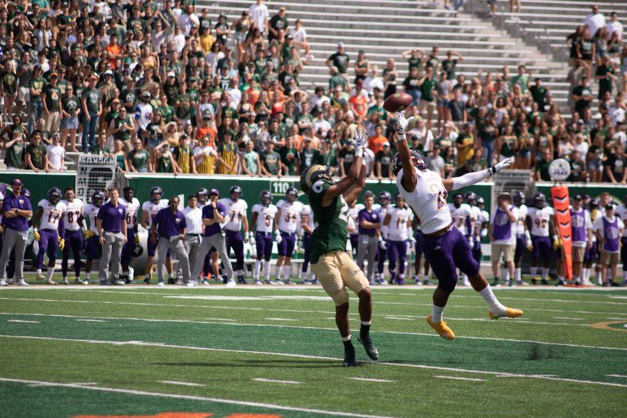 Colorado State University wide receiver Dante Wright (22) stretches out to catch a pass from quarterback Collin Hill (15) during Colorado State's first home game against Western Illinois, Sept. 7, 2019. CSU defeated Western Illinois University 38-13. (Devin Cornelius | The Collegian)