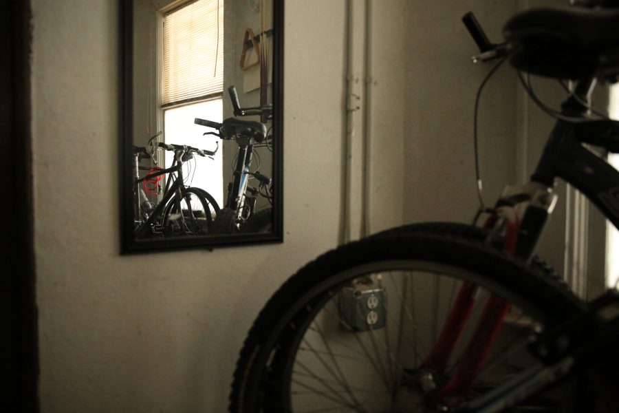 A collection of personal and project bikes fill up a couple corners of David Stitzels work space and living room. (Forrest Czarnecki | The Collegian)