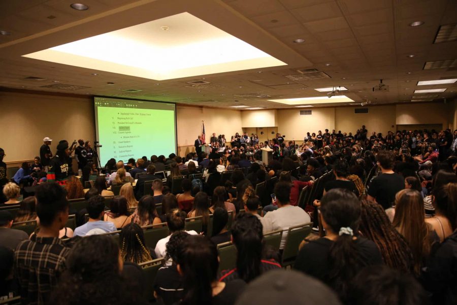 A large crowd listens to speakers at the Associated Students of Colorado State University senate session Sept. 18, 2019, during a discussion of the blackface image that has been circulating on social media recently. The senate session was moved to the North Ballroom of the Lory Student Center to a accommodate for an unusually large crowd size. (Forrest Czarnecki | The Collegian)