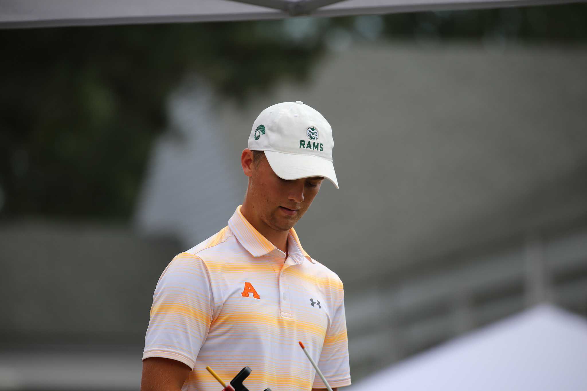 Golfer in CSU Hat