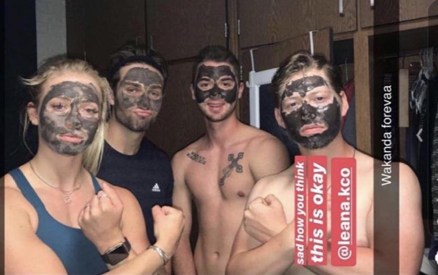 Students wearing charcoal face masks pose in a Snapchat photo. (Collegian file photo)