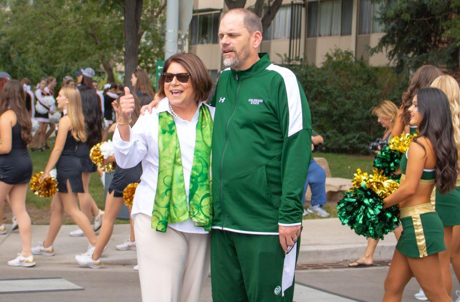 University President Joyce McConnell smiles for a photo with CSU football's head coach Mike Bobo, before a game. (Devin Cornelius | Collegian)