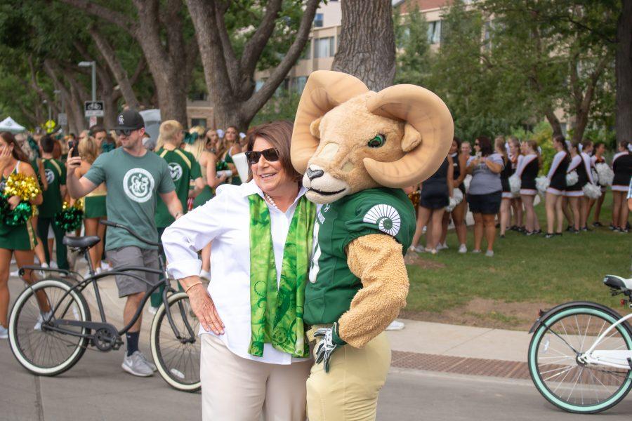 Cam the Ram poses with University President Joyce McConnell. (Devin Cornelius | Collegian)