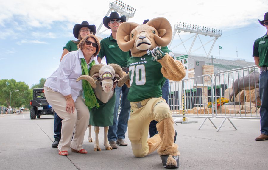 Cam the Ram poses with University President Joyce McConnell, CSU's mascot Cam the Ram, and the Ram handlers. (Devin Cornelius | Collegian)