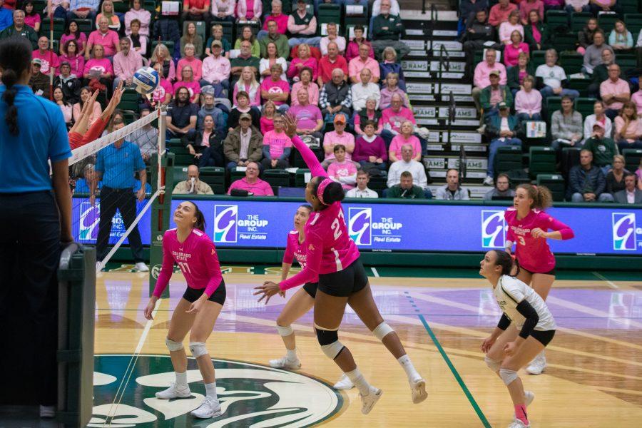 Jessica Jackson(21) spikes the ball towards the Fresno State side, during the Pink Out game at Moby arena, against Fresno State University. Colorado State wins three sets to zero. (Devin Cornelius | Collegian)