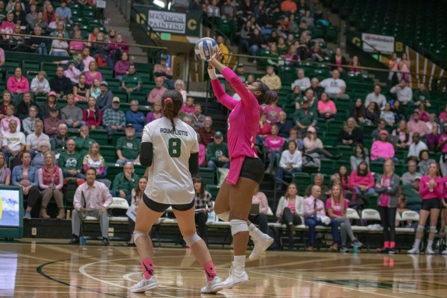 Breana Runnels(15) bumps the ball towards setter Katie Oleksak, during Colorado State's home Pink Out game against Fresno State University. CSU defeats FSU three sets to zero. (Devin Cornelius | Collegian)