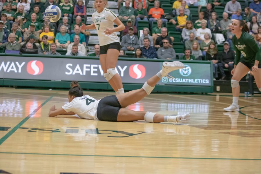 Brooke Hudson(#4) digs the ball up into the air, during Colorado State's home game against San Diego State. CSU sweeps SDSU three sets to zero. (Devin Cornelius | Collegian)