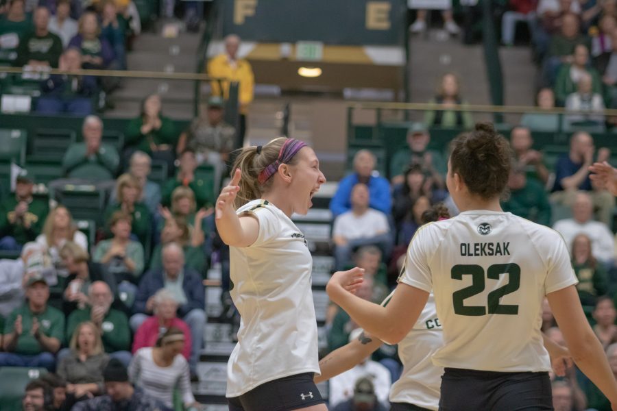 Alyssa Bert(#0) celebrates with her teammates after her first service ace of the game, as Colorado State takes on San Diego State at Moby arena. CSU sweeps SDSU. (Devin Cornelius | Collegian)