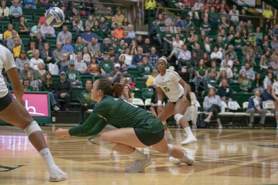 Alexa Roumeliotis(#8) digs the ball up into the air, as Colorado State, takes on San Diego State at home. CSU defeats SDSU in three sets. (Devin Cornelius | Collegian)