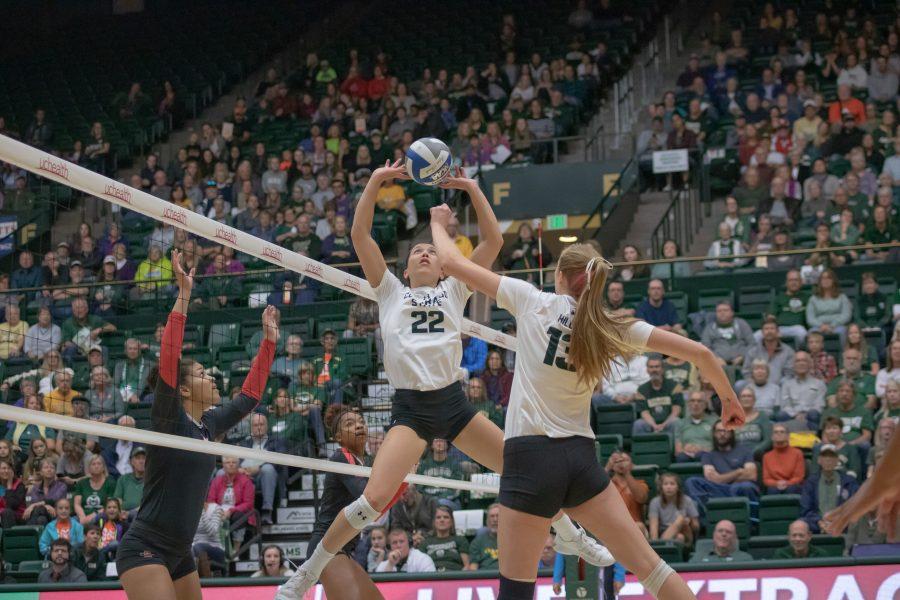 Katie Oleksak(#22) sets the ball to Kirstie Hillyer(#13) as she prepares to spike, during the Colorado State game against San Diego State. CSU sweeps SDSU in three sets. (Devin Cornelius | Collegian)