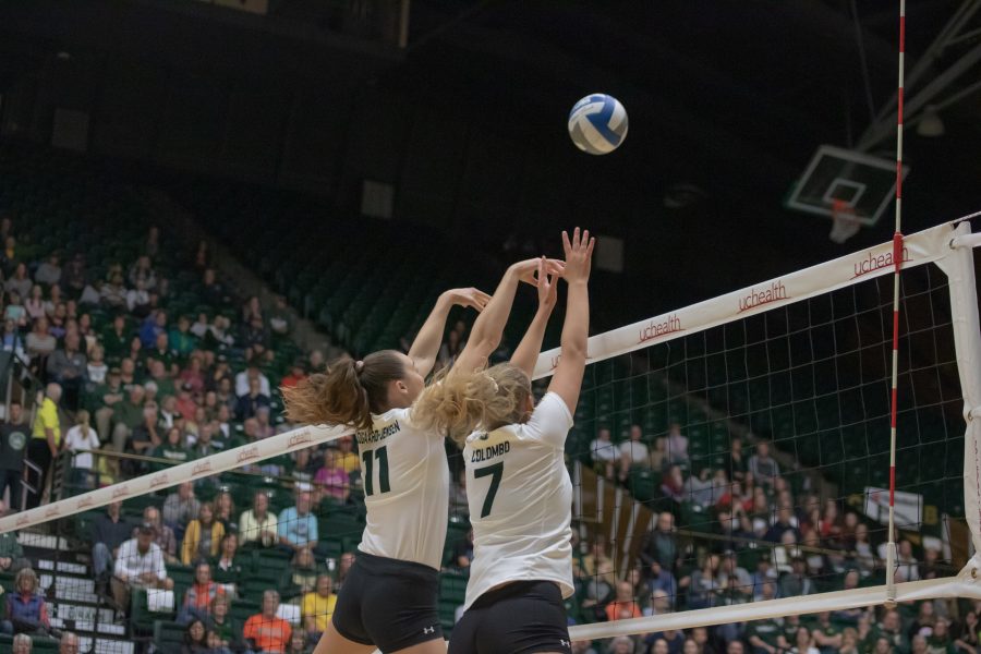 Paulina Hougaard-Jensen(#11) and Sasha Colombo(#7) block an incoming spike as Colorado State takes on San Diego State at home. CSU sweeps SDSU in three sets. (Devin Cornelius | Collegian)