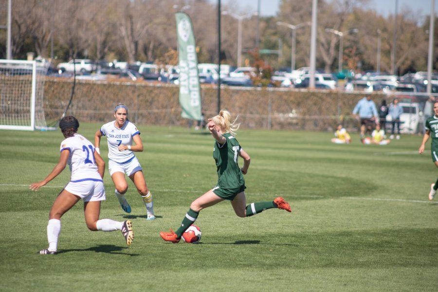 Ally Murphy-Pauletto(#17) prepares to pass the ball to a teammate down the field, as Colorado State battles San Diego State at home. CSU wins two goals to one. (Devin Cornelius | Collegian)