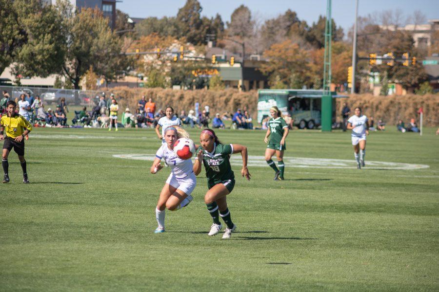 Kendra Gipson(#18) races to get to the ball before an opponent, as Colorado State takes on San Diego State at home. CSU wins goals two to one.  (Devin Cornelius | Collegian)