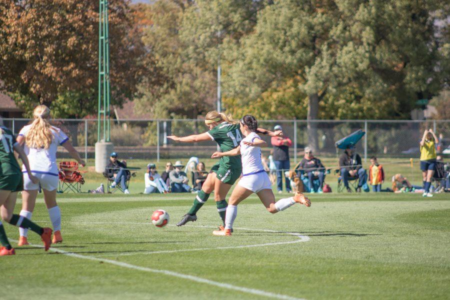Caeley Lordemann(#14) shoots and scores a Colorado State point, during the CSU home game against San Diego State.  CSU wins two goals to one. (Devin Cornelius | Collegian)