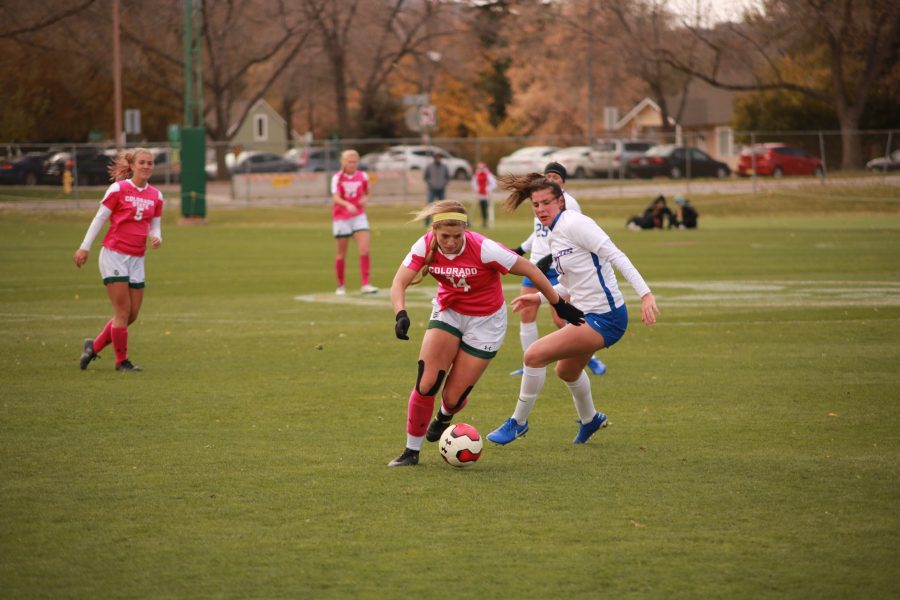 Caeley Lordemann(#14) cuts past a defender towards the Boise State goal, as Colorado State takes on Boise State at home. CSU falls 1-0. (Devin Cornelius | Collegian)