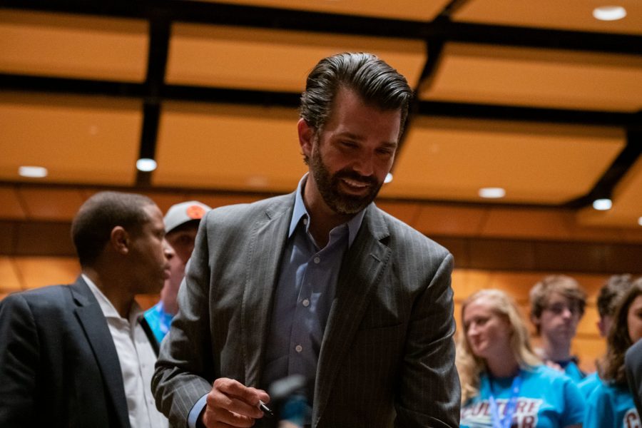 Donald Trump Jr. signs signs autographs for audience members following Charlie Kirk’s “Culture War,” tour at the University Center for the Arts Oct. 22. (Colin Shepherd | The Collegian)
