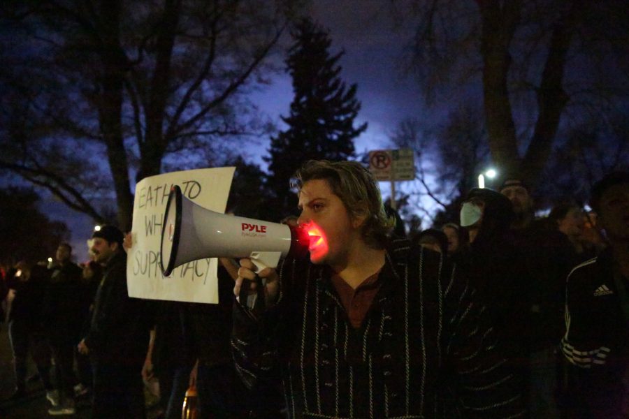 A protester chants at conservative protesters outside the Charlie Kirk Culture War event at the University Center for the Arts Oct. 22, 2019. The event featured both Charlie Kirk, a prominent conservative speaker, and Donald Trump Jr. (Forrest Czarnecki | The Collegian)