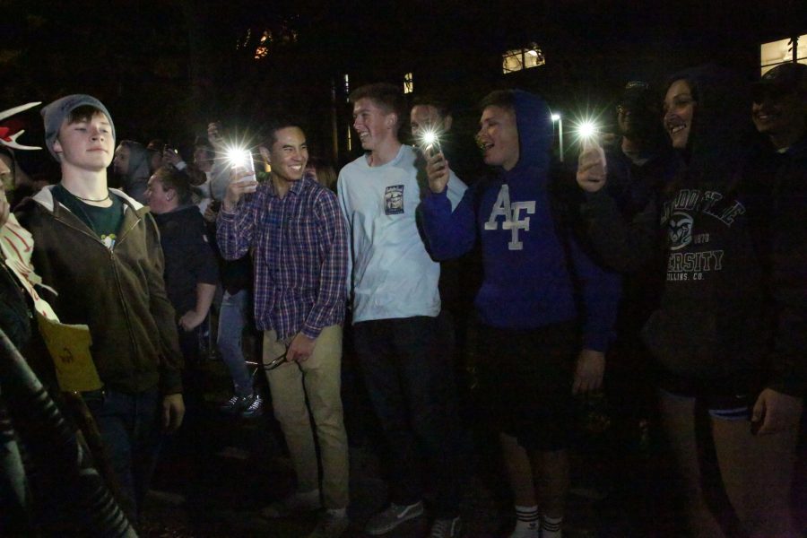 Protesters record other protesters being led away by police at the Charlie Kirk Culture War event at the University Center for the Arts Oct. 22, 2019. The event featured both Charlie Kirk, a prominent conservative speaker, and Donald Trump Jr., where they discussed conservative values and socialism in the U.S. (Forrest Czarnecki | The Collegian)