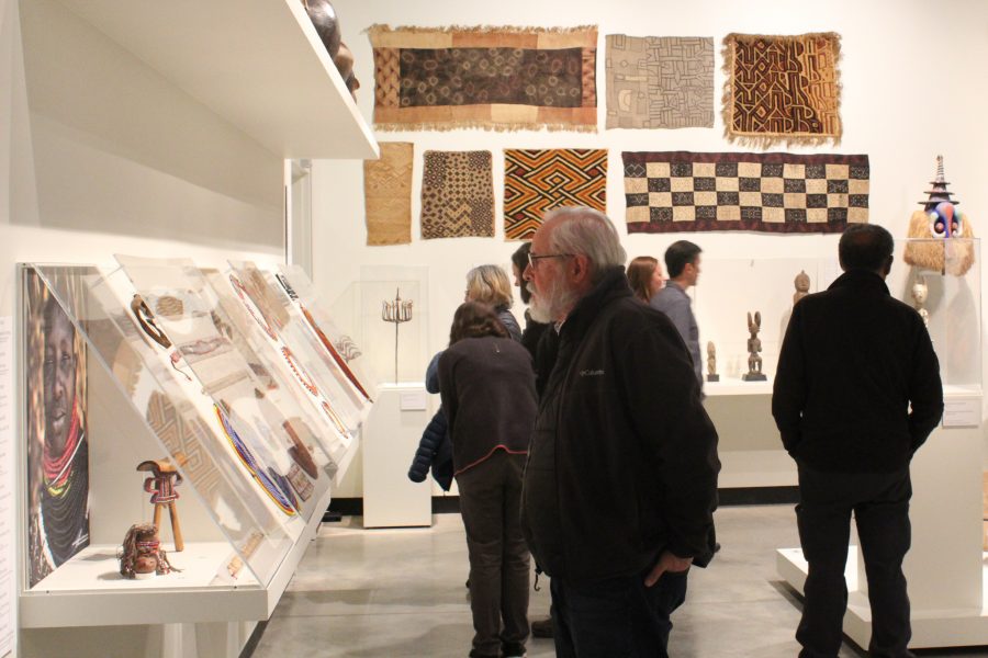 People view the Africa Gallery Permanent Collection curated by David Riep and Lauren Karbula at the Gregory Allicar Museum of Art on Oct. 24th. The museum tour followed the viewing of two acclaimed short films, Mthunzi and Mma Moeketsi. (Megan McGregor | The Collegian)