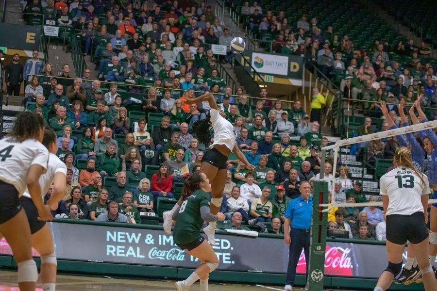 Breana Runnels(#15) spikes the ball down on her opponents, during the University home game against San Jose State. CSU wins three sets to zero. (Devin Cornelius | Collegian)
