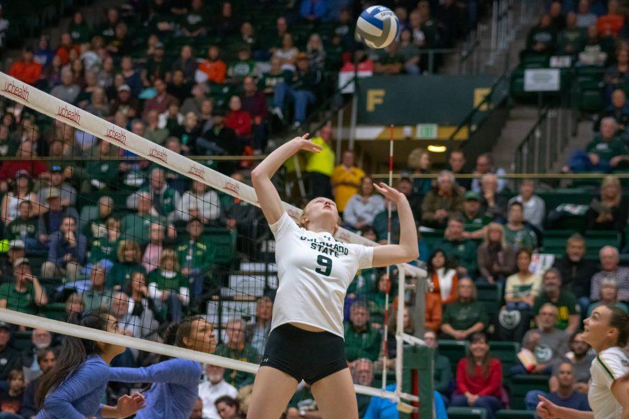 Ciera Zimmerman(#9) sets the ball to one of her teammates, during a University home game vs San Jose State. CSU wins three sets to zero. (Devin Cornelius | Collegian)
