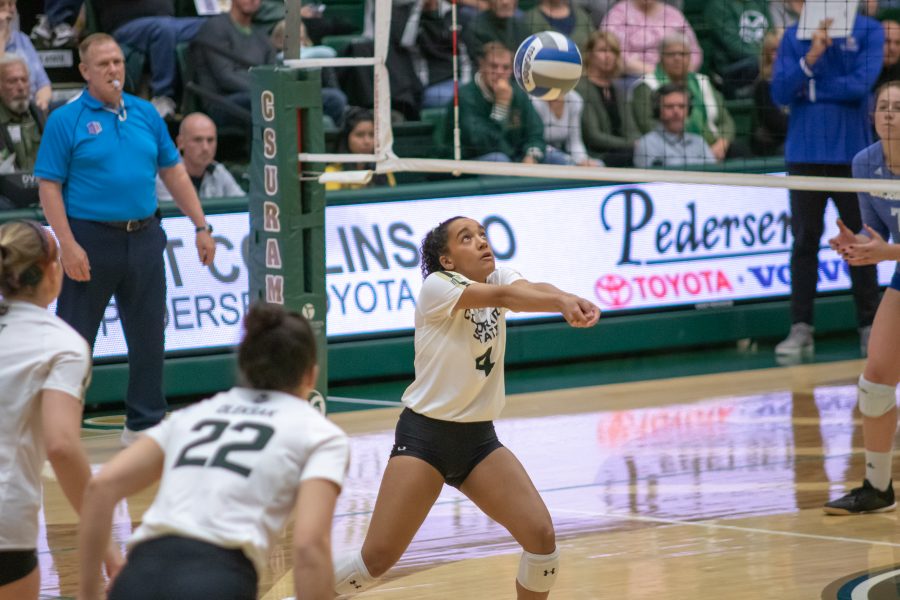 Brooke Hudson(#4) bumps the ball up into the air for setter Katie Oleksak(#22), during a University home game against San Diego State. CSU wins three sets to zero. (Devin Cornelius | Collegian)