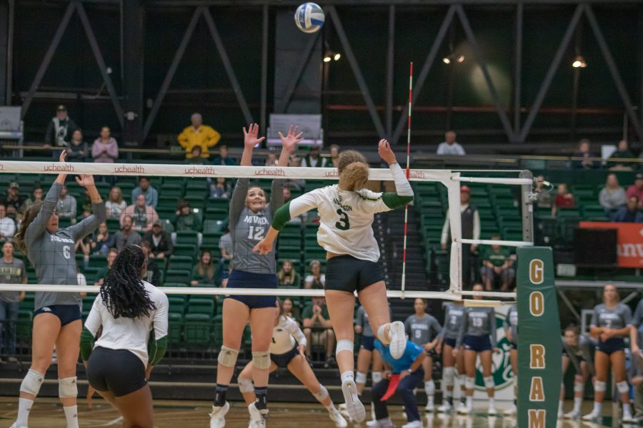 Olivia Nicholson(#3) scores a kill and ties the final set against Nevada, during the University home game. CSU wins three sets to zero. (Devin Cornelius | Collegian)