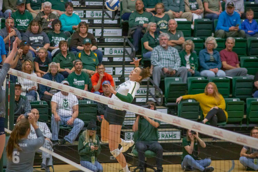 Paulina Hougaard-Jensen(#11) prepares to spike the ball down on the Opponent's side, during the University home game against Nevada. CSU wins three sets to zero. (Devin Cornelius | Collegian)