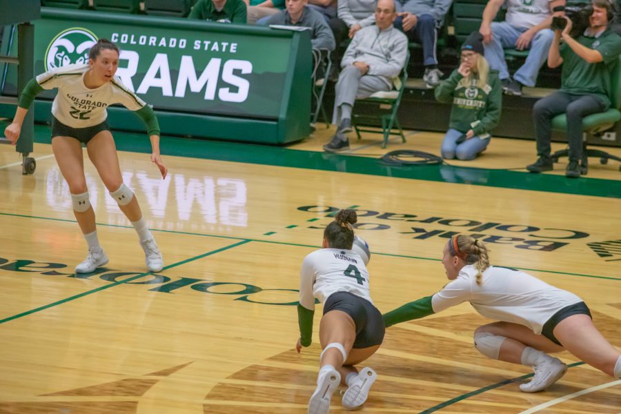 Brooke Hudson(#4) and Alyssa Bert(#0) dive to save the ball, during the University's game against Nevada. CSU wins three to zero. (Devin Cornelius | Collegian)