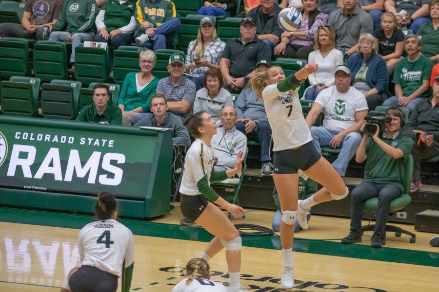 Sasha Colombo(#7) leaps and bumps the ball back towards the net, during the University home game against Nevada. CSU wins three sets to zero. (Devin Cornelius | Collegian)