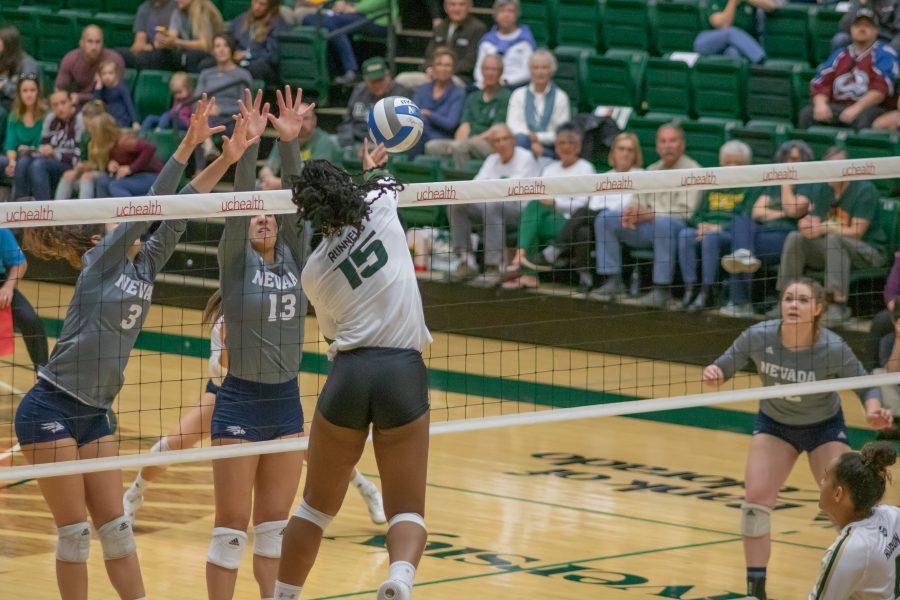 Breana Runnels(#15) spikes the ball towards the Opponents side, during the University home game against Nevada. CSU wins three sets to zero. (Devin Cornelius | Collegian)