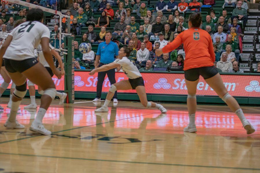 Katie Oleksak (22) bumps the ball towards one of her teammates, during the University game against Air Force. CSU sweeps Air Force three to zero.(Devin Cornelius | Collegian)