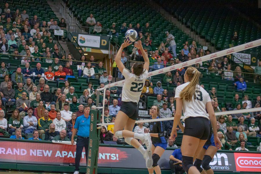 Katie Oleksak (22) sets the ball into the air as Kirstie Hillyer (13) watches, during the University's home game against Air Force. CSU wins three sets to zero. (Devin Cornelius | Collegian)
