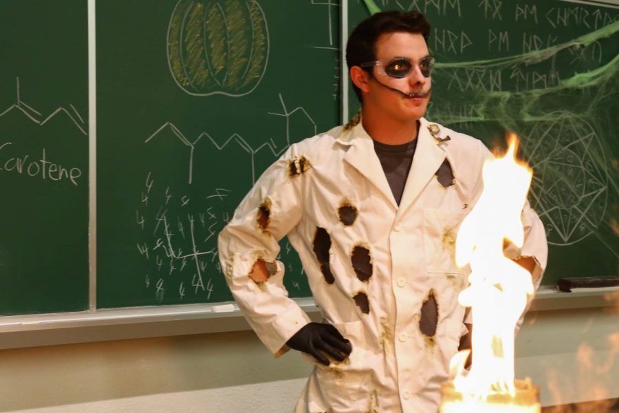 The skeleton man with the fire is Chemistry Club Demo Specialist Luca Zocchi, and hes a senior chemistry major, and he volunteers as the Mad Scientist at the Mad Scientist Show. (Courtesy of Julia Trowbridge)