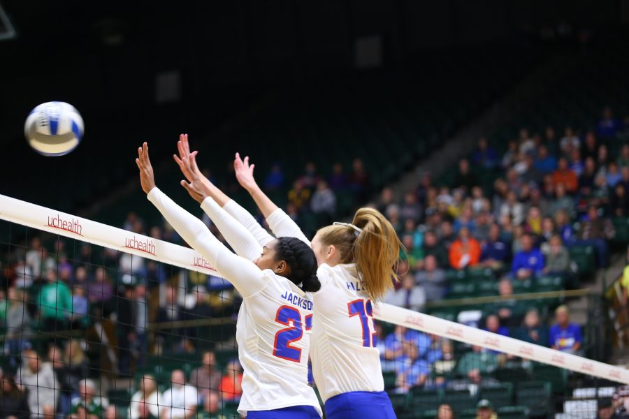 Jessica Jackson (21) Kirstie Hillyer (13) go up for the block. (Luke Bourland | The Collegian) 