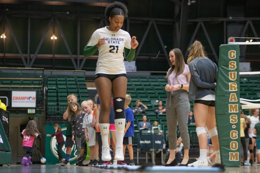 Jessica Jackson shows children how to do the speed 
ladder drill, during a Ram Volleyball Clinic on Oct 26 at Moby Arena. (Devin Cornelius | Collegian)