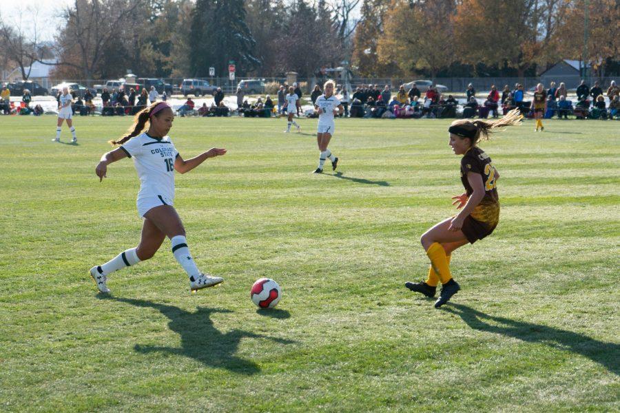 Kendra Gipson (18) dribbles the ball past an opponent during the Womens Soccer game on Friday November 1st against Wyoming. The game ended in a tie, 0-0, after two overtimes. (Skyler Pradhan | Collegian)