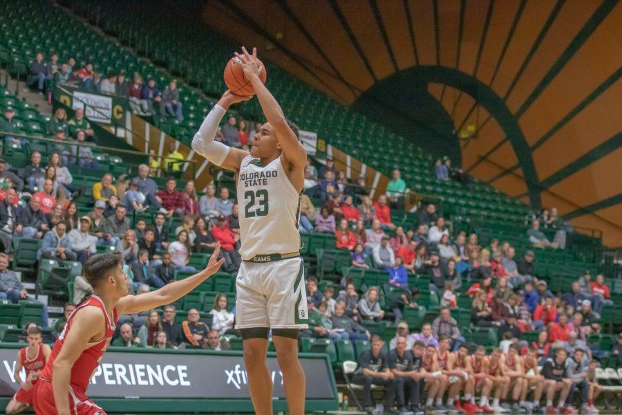 John Tonje (23) shoots from three, during the University exhibition match against Western Colorado University. CSU wins 79-41. (Devin Cornelius | Collegian)