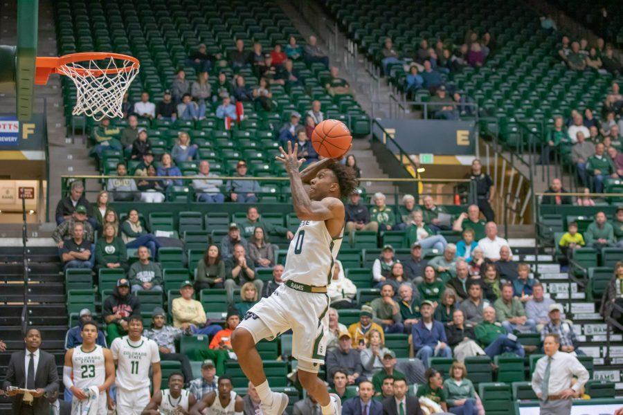 Hyron Edwards (0) leaps up for a dunk, during the University exhibition game against Western Colorado. CSU wins 79- 41(Devin Cornelius | Collegian)