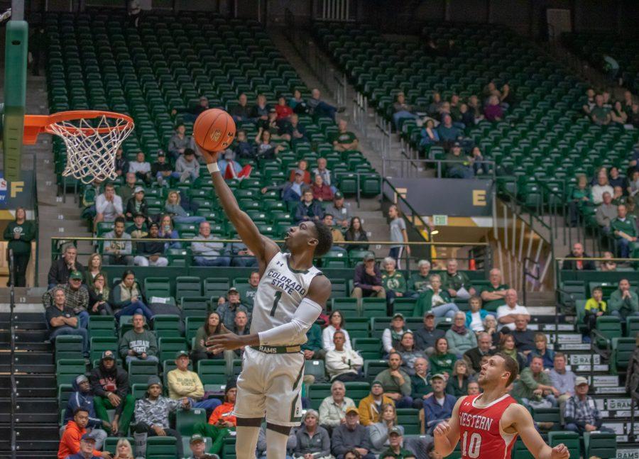 Kris Martin (1) shoots a layup after a fastbreak, during the University exhibition match against Western Colorado. CSU wins 79-41. (Devin Cornelius | Collegian)