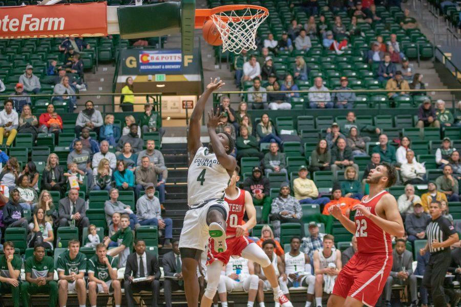 Isaiah Stevens (4) drives and shoots a layup, during the University exhibition match against Western Colorado. CSU wins 79-41. (Devin Cornelius | Collegian)