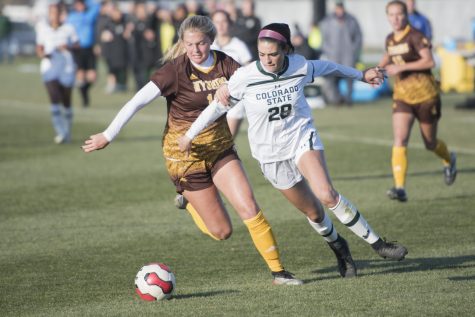 Sophomore forward Kristen Noonan dribbles past a defender in the second half. (Lucy Morantz | The Collegian)
