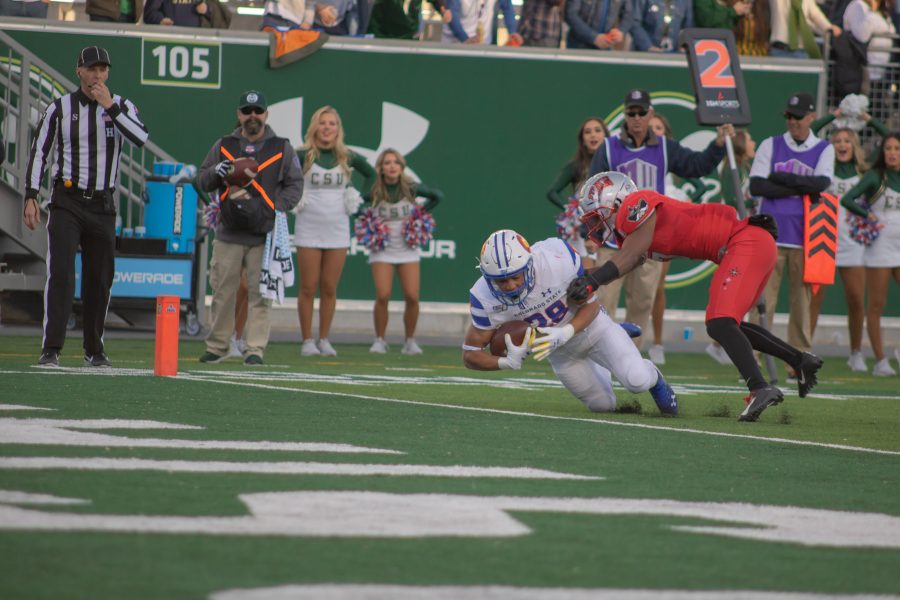 Christian Hunter (28) falls into the end zone for a Colorado State touchdown, as CSU takes on the University of Las Vegas at home. CSU wins 37-17. (Devin Cornelius | Collegian)