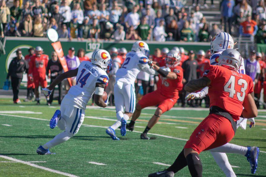Anthony Hawkins (14) returns the kickoff for a touchdown, during the University home game against the University of Las Vegas. CSU wins 37-17.(Devin Cornelius | Collegian)