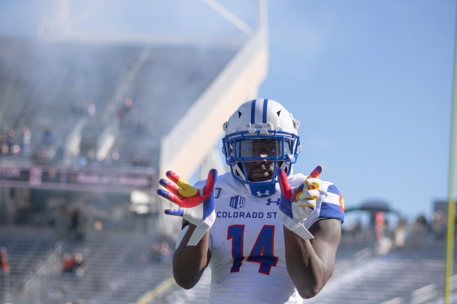 Anthony Hawkins (14) celebrates after returning the opening kickoff for a touchdown, as the University takes on the University of Las Vegas at home. CSU wins 37-17.(Devin Cornelius | Collegian)