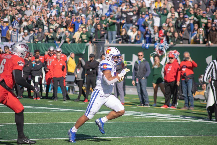 Jaylen Thomas (27) runs the ball in for a Colorado State touchdown, as the Rams take on the University of Las Vegas at Canvas Stadium. CSU wins 31-17. (Devin Cornelius | Collegian)