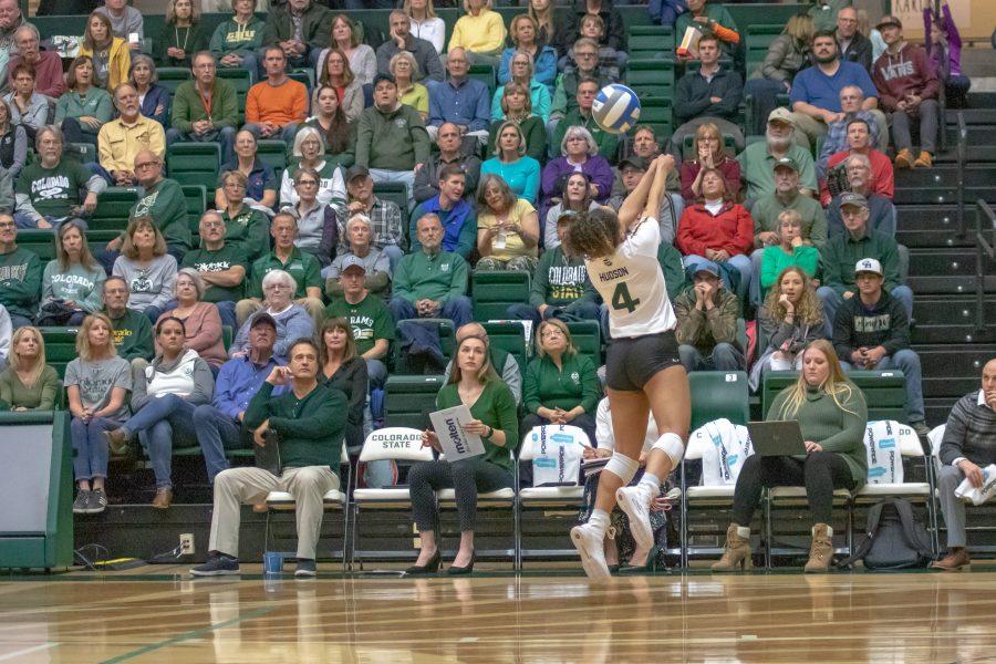 Brooke Hudson (4) stretches to stop the ball from going out of play, as the University faces Utah State at home on Nov 14. CSU wins three sets to zero. (Devin Cornelius | Collegian)